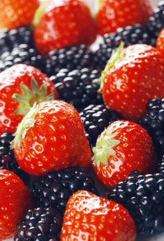 Strawberries and blackberries - shot in studio with a 21 megapixel camera