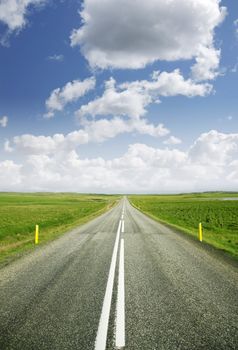 Empty rural road on a beautiful summer day