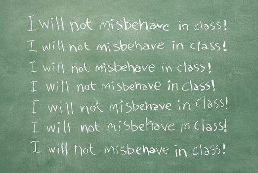 large XXL image of an old chalkboard with the sentence I will not misbehave in class written over and over again
