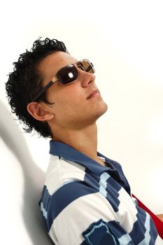 Portrait of casual trendy hispanic teen wearing sunglasses - isolated