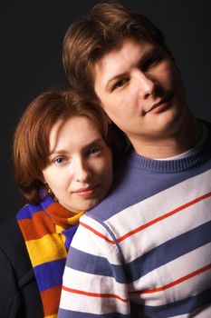 Attractive couple portrait. Close-up view