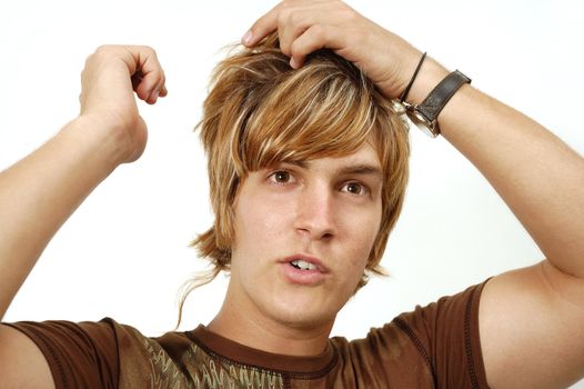 Portrait of young trendy male with blond hair