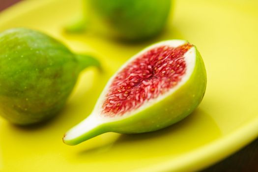 Delicious vibrant honey sweet green fig. Figs halved