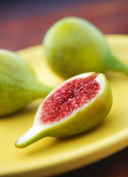 Delicious vibrant honey sweet green fig. Figs halved