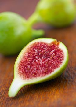 Delicious vibrant honey sweet green fig. Figs halved