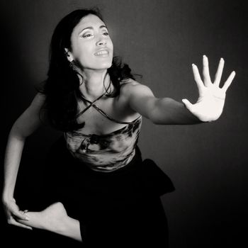 Female contemporary dancer doing gesture with a hand