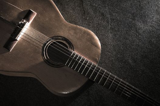 Still life with old acoustic guitar 