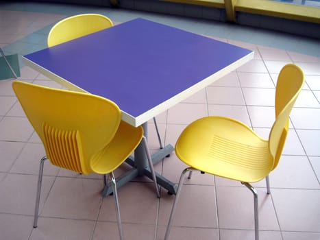 a modern set of table and chairs
