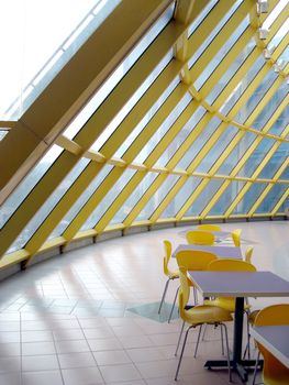 a corner cafe with a glass roof