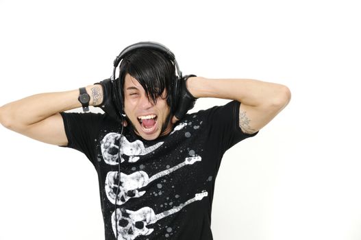 Portrait of trendy young man screaming with headphones - isolated