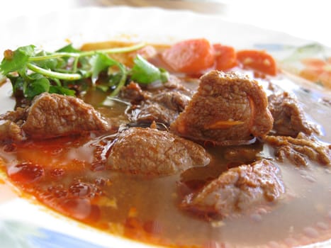 close up for a plate of beef stewed