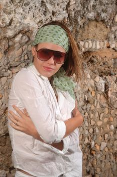 Portrait of young fashionable woman wearing sunglasses