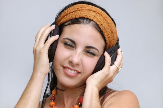 Portrait of hispanic girl wearing headphones