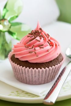 Pink cupcake, ready to eat