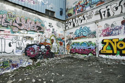 Scene from the ghetto - abandoned houses with a lot of graffiti