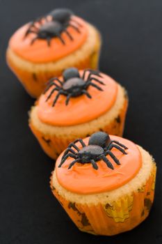 Three halloween cupcakes in a row