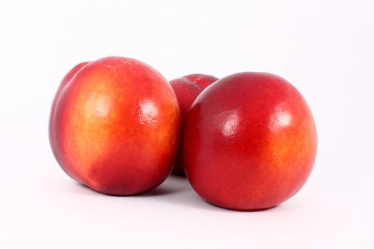 fresh colorful ripe nectarines, isolated