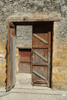 Open and closed wooden doors