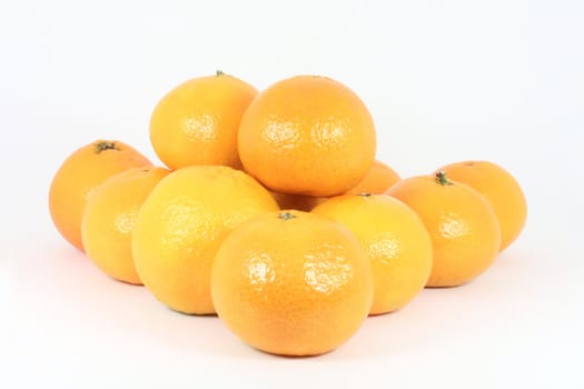 Stack of oranges isolated on white
