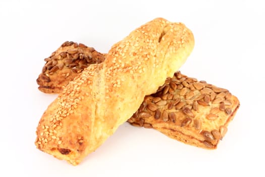 Two pastries with sesame and sunflower seeds isolated