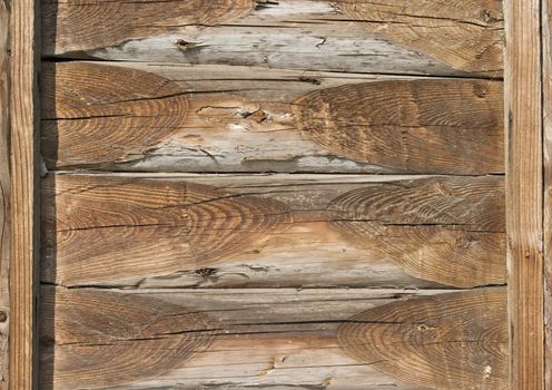 Structure of a log of old walls of a wooden log hut