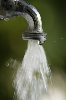 water running from a garden tap