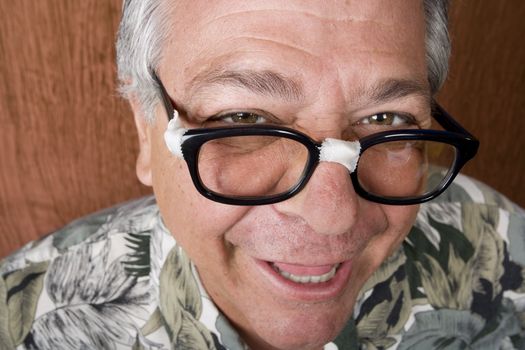 Silly Mexican-Italian Man with Taped Corrective Glasses