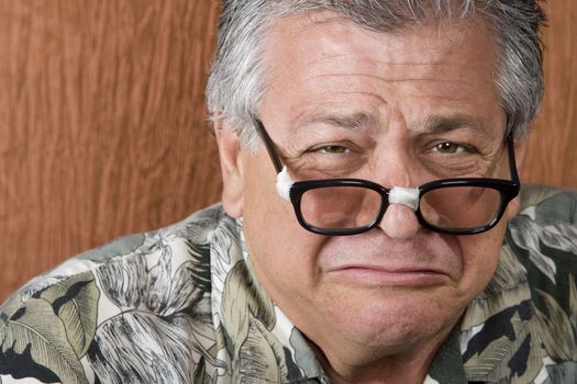 Silly Mexican-Italian Man with Taped Corrective Glasses