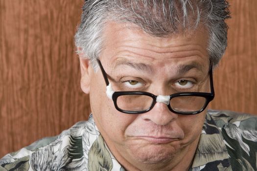 Silly Mexican-Italian Man with Taped Corrective Glasses