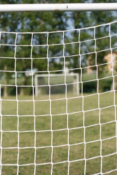football goal-posts, goal, net, soccer, field