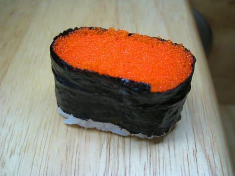 a slide of Tobiko Gunkan sushi