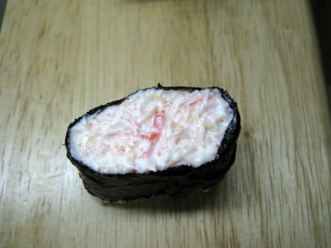 a mixture sushi with fish egg, crab meat and mayonnaise