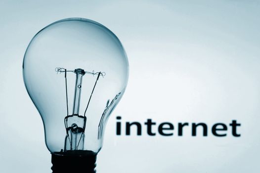 bulb on blue background showing concept of internet communication