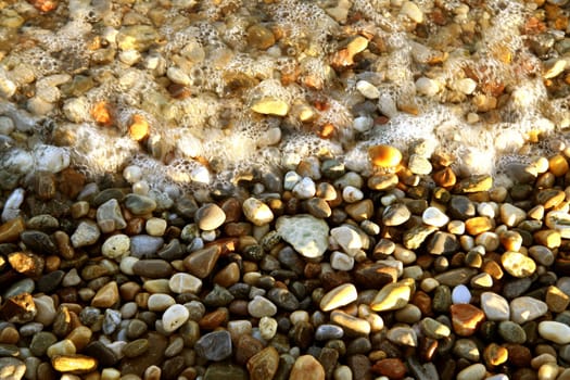 Gravel stones and foam background