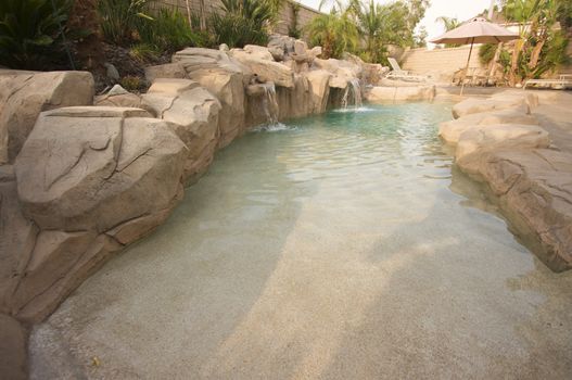 Tropical Custom Pool with waterfalls.