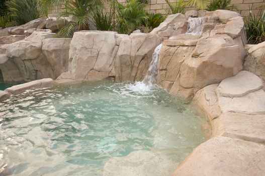 Tropical Custom Pool with waterfalls.