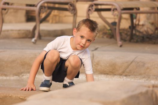 Young Boy Portrait Near Swimming Pool