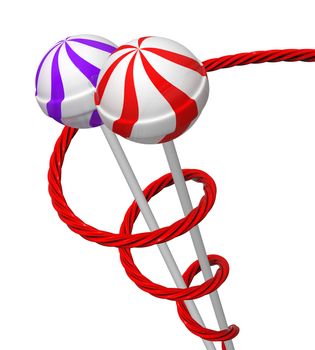 two lollipops wrapped with a red liquorice, on a white background