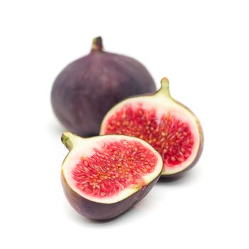 fresh juicy figs on white background