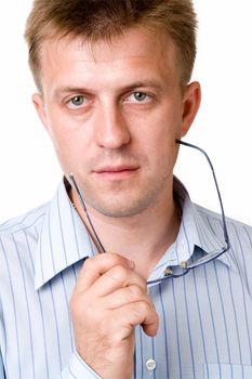 serious man with glasses on a white background.