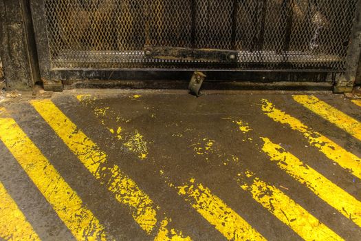 Grunge Warning Stripes by the Freight Elevator