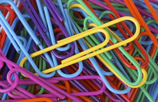 Extreme close-up of multi colored paper clips