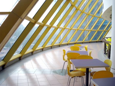 a corner cafe with a glass roof