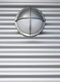 galvanized lamp on industry wall