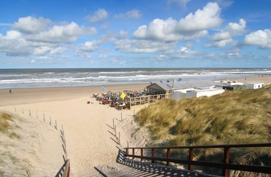 Stairs across the dunes leading to a beach club