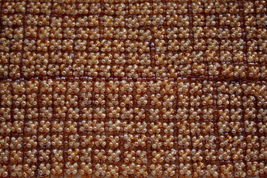 Close up of the brown beads ornament