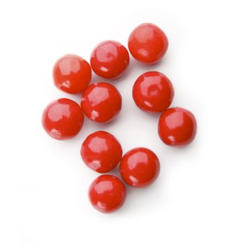 Red bubble gum balls isolated on white