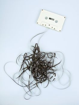 Retro tape all messed up isolated on light background
