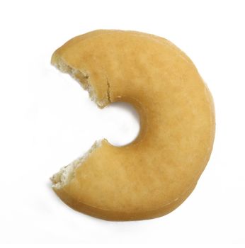 Juicy doughnut with missing bite isolated on white background