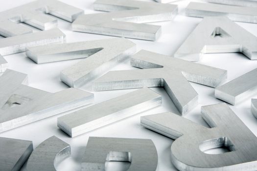 Stylish letters cut out of polished steel